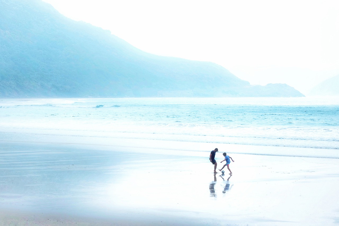 father and son, beach, football-7488520.jpg